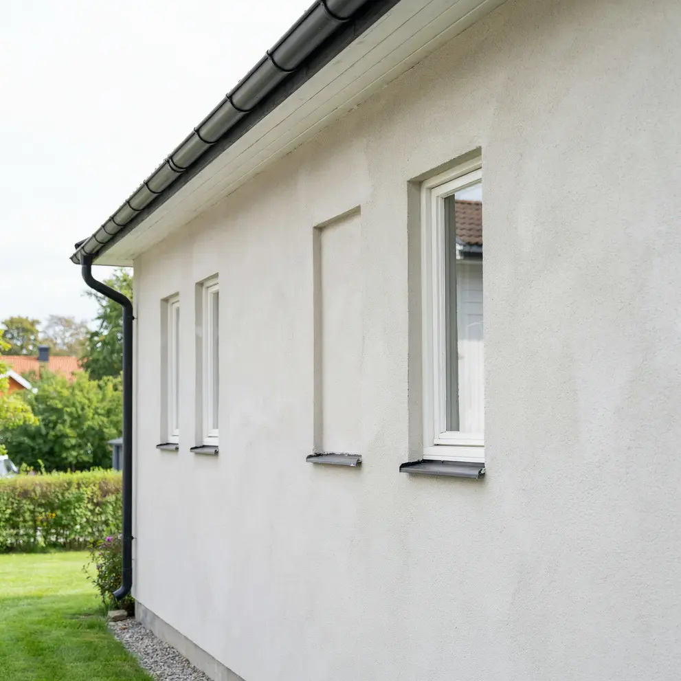 renovera vattenskadad putsfasad stenfasad enskede stockholm